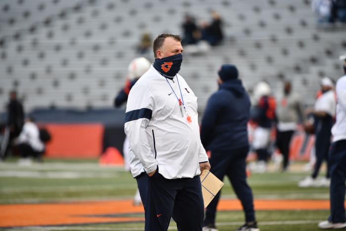 Illinois head coach Bret Bielema looks over pre-game warmups for the 2021 spring game on April 19, 2021.
